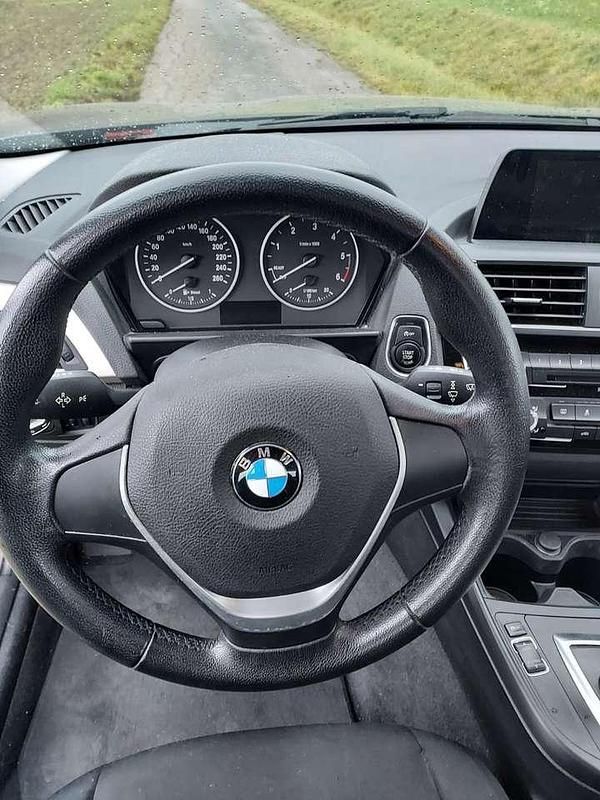 Używany BMW 116 116 KM (85 kW) 2015 Czarny Hatchback