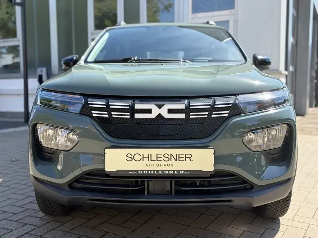 Gebraucht Dacia Spring Essentiel 33 kW (45 PS) 2023 Olivgrün Kleinwagen
