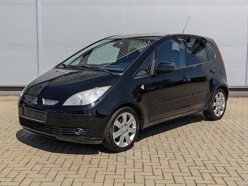 Cosmos schwarz metallic Gebraucht 2006 Mitsubishi Colt Motion Kleinwagen | 800 € (Superpreis) - Bild 1/4