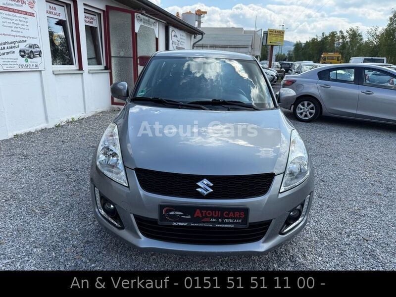 Grau Gebraucht 2016 Suzuki Swift Comfort Limousine | 6.699 € (Guter Preis) - Bild 1/4
