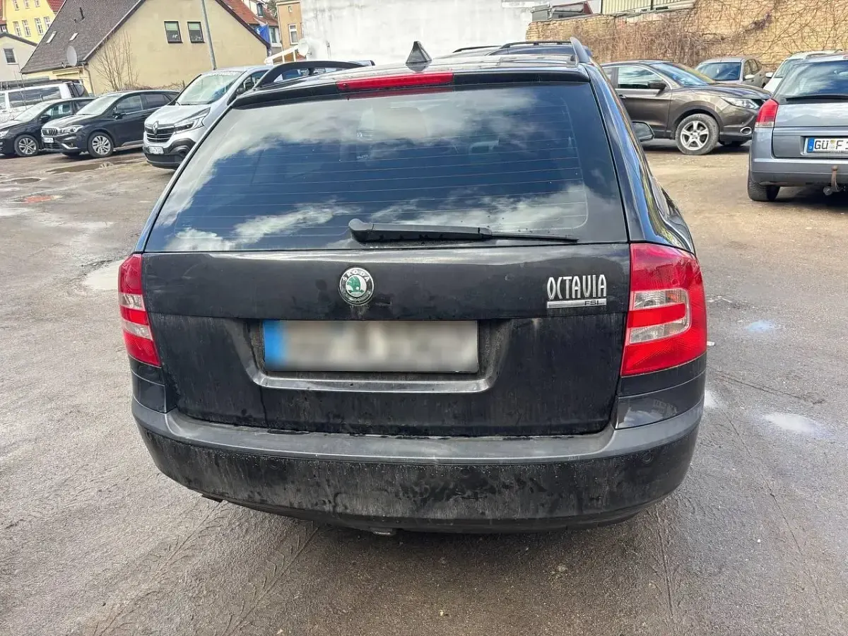 Używany Skoda Octavia 102 KM (75 kW) 2004 Czarny Kombi