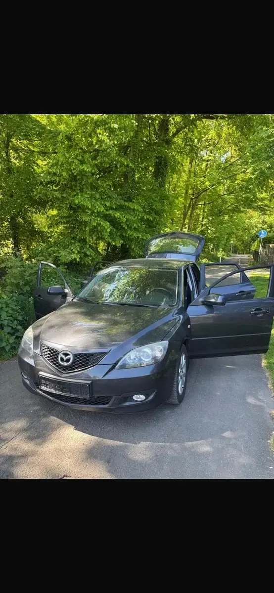 Używany Mazda 3 109 KM (80 kW) 2007 Szary Hatchback