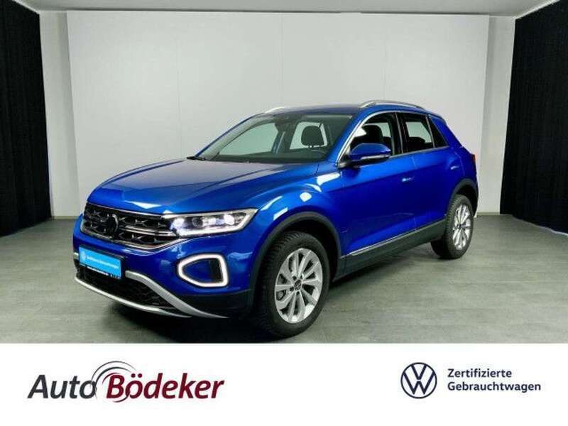 Ravennablau Gebraucht 2024 VW T-Roc Style SUV | 30.490 € (Guter Preis) - Bild 1/4