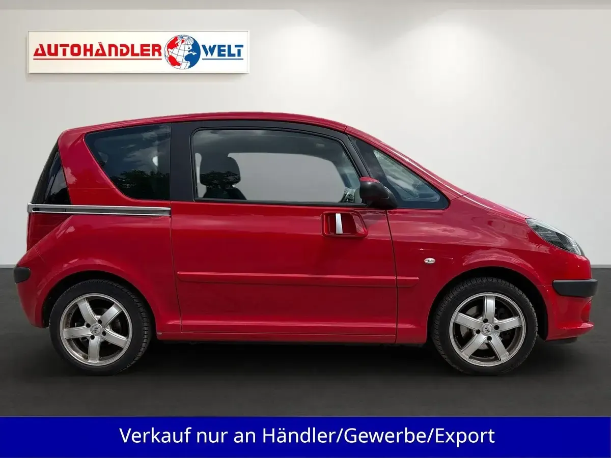 Gebraucht Peugeot 1007 Premium 109 PS (80 kW) 2009 Rot Van / Kleinbus