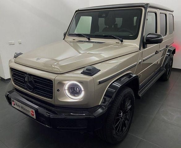 Manufaktur travertinbeige metallic Gebraucht 2024 Mercedes G400 AMG SUV | 169.889 € - Bild 1/4