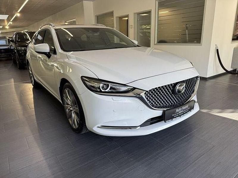 Weiß Gebraucht 2024 Mazda 6 Takumi-Line Kombi | 30.890 € (Fairer Preis) - Bild 1/4