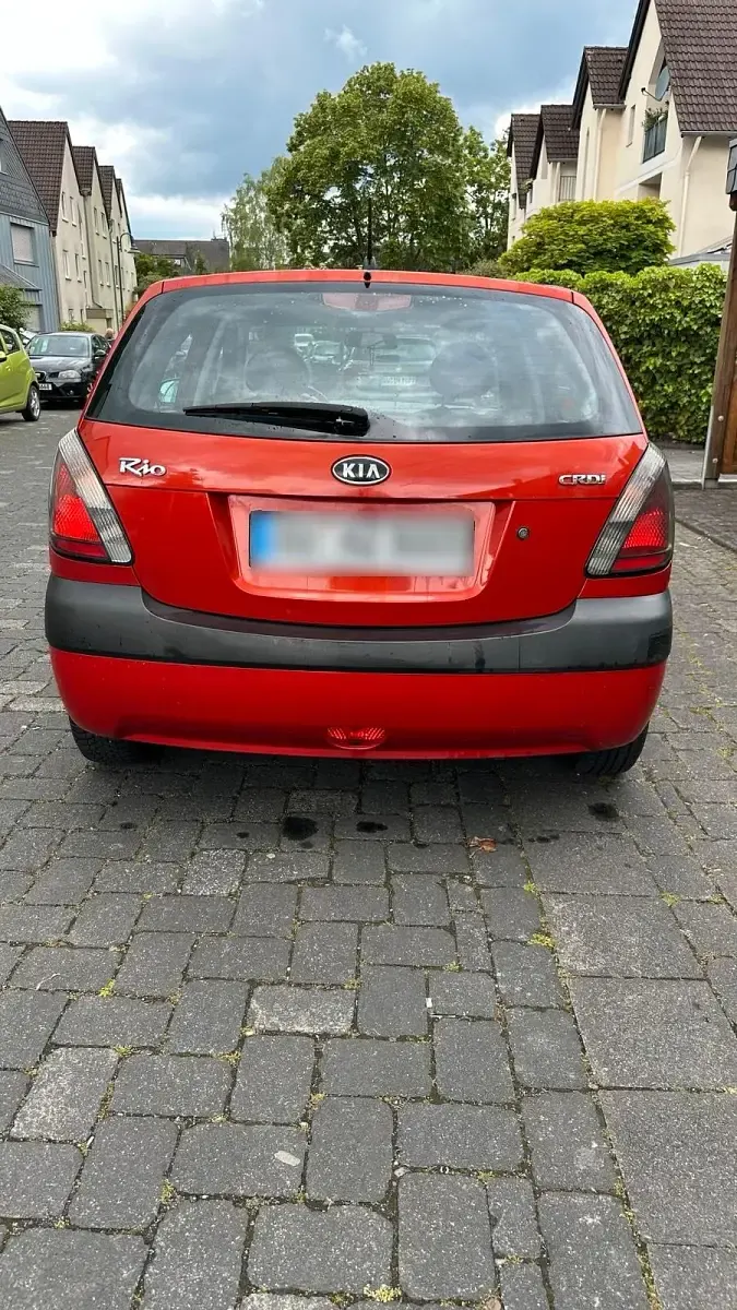 Używany Kia Rio 90 KM (66 kW) 2009 Czerwony Hatchback