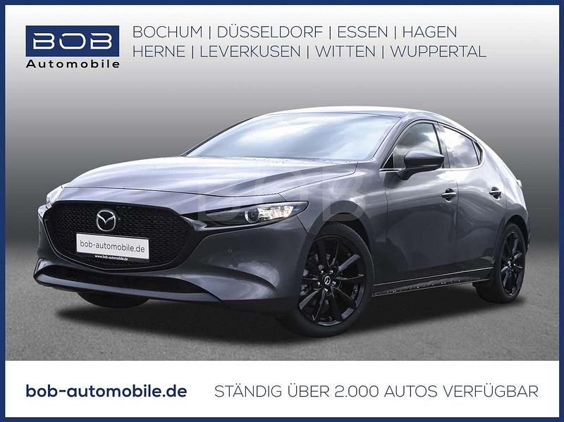 Machine gray Neu 2025 Mazda 3 Homura-Line Limousine | 27.879 € - Bild 1/3
