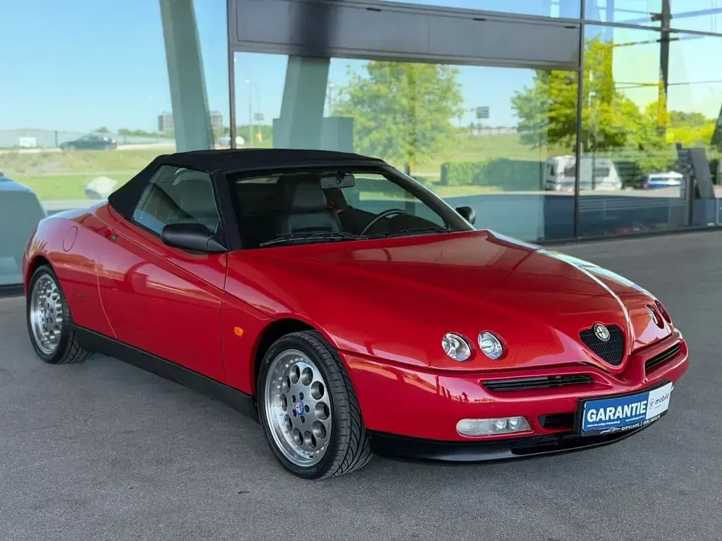Second-hand Alfa Romeo Spider 165 CP (121 kW) 1998 Roșu Cabrio
