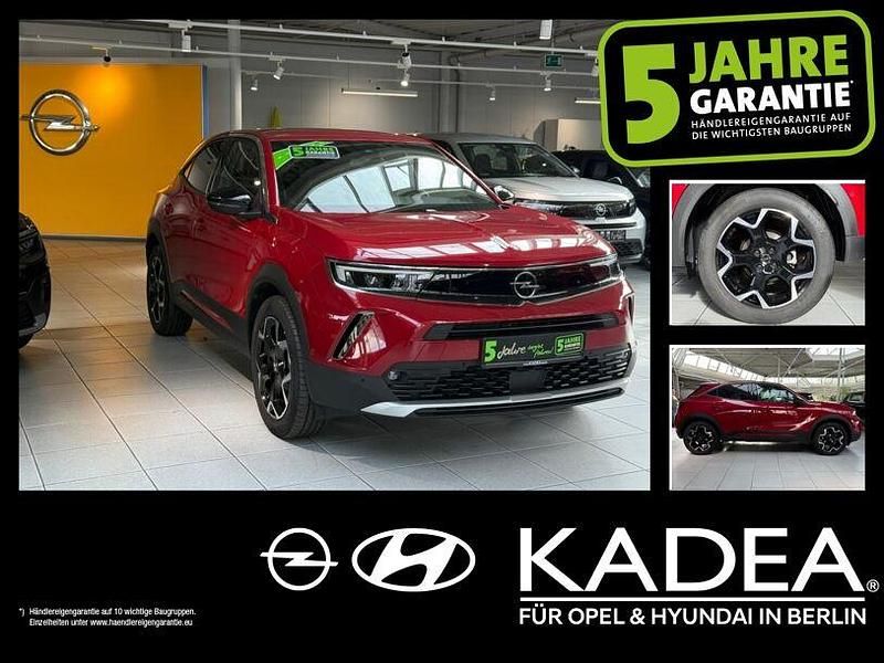 Lackierung rot rubi/typ aussenverkleidun (metallic) Gebraucht 2023 Opel Mokka-e Ultimate SUV | 24.990 € (Teuer) - Bild 1/4