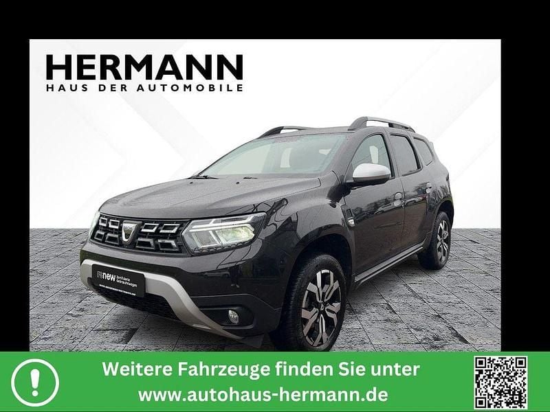Perlmuttschwarz metallic Gebraucht 2022 Dacia Duster Prestige SUV | 18.781 € (Fairer Preis) - Bild 1/4