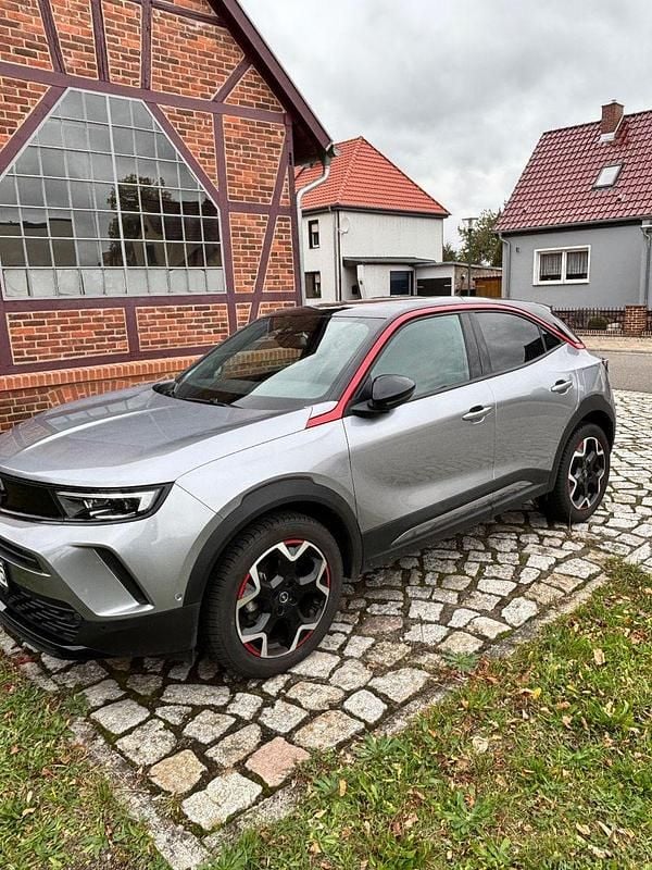 Grau Gebraucht 2021 Opel Mokka GS Line SUV | 16.999 € (Superpreis) - Bild 1/2