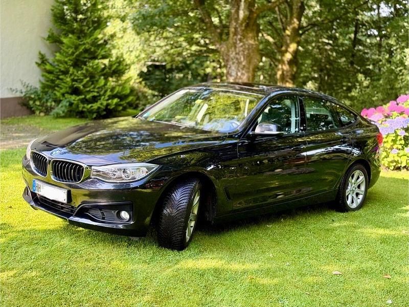 Schwarz Gebraucht 2013 BMW 320 Gran Turismo Sport Line Limousine | 9.999 € (Superpreis) - Bild 1/4