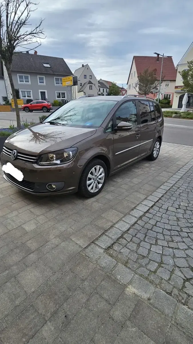 Używany VW Touran 105 KM (77 kW) 2012 Brązowy Minivan