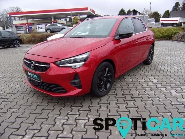 Rot (chilli rot met./dach diamant sch) Gebraucht 2022 Opel Corsa Ultimate Kleinwagen | 17.350 € (Fairer Preis) - Bild 1/3