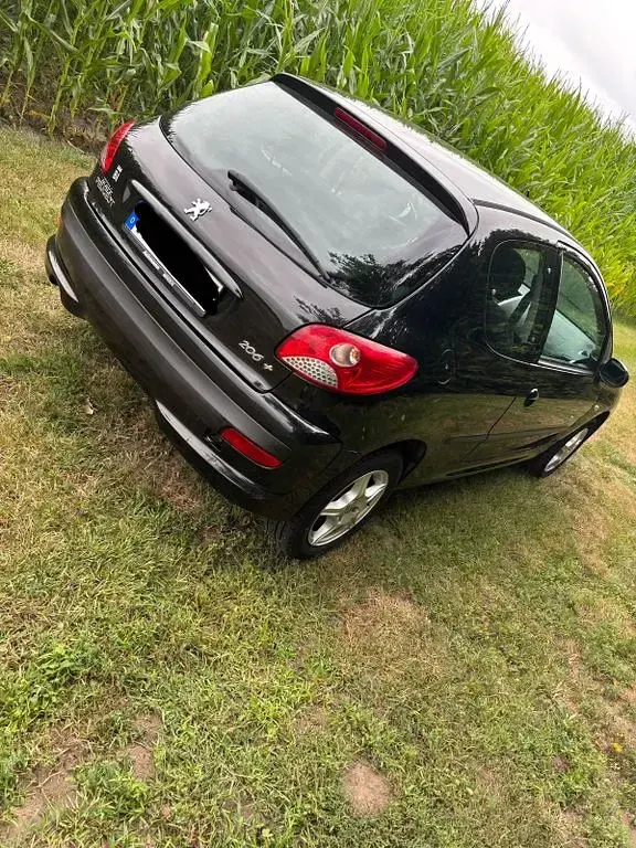 Gebraucht Peugeot 206 60 PS (44 kW) 2010 Schwarz Limousine