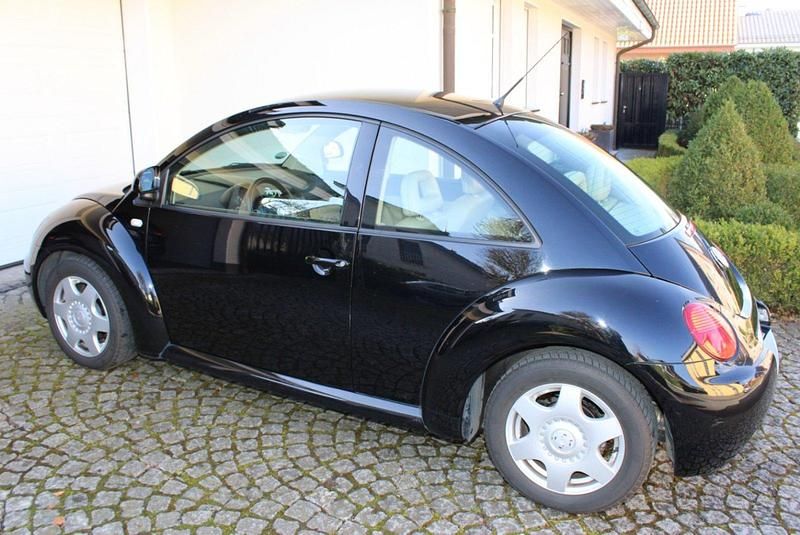 Gebraucht VW New Beetle 115 PS (84 kW) 1999 Schwarz Kleinwagen
