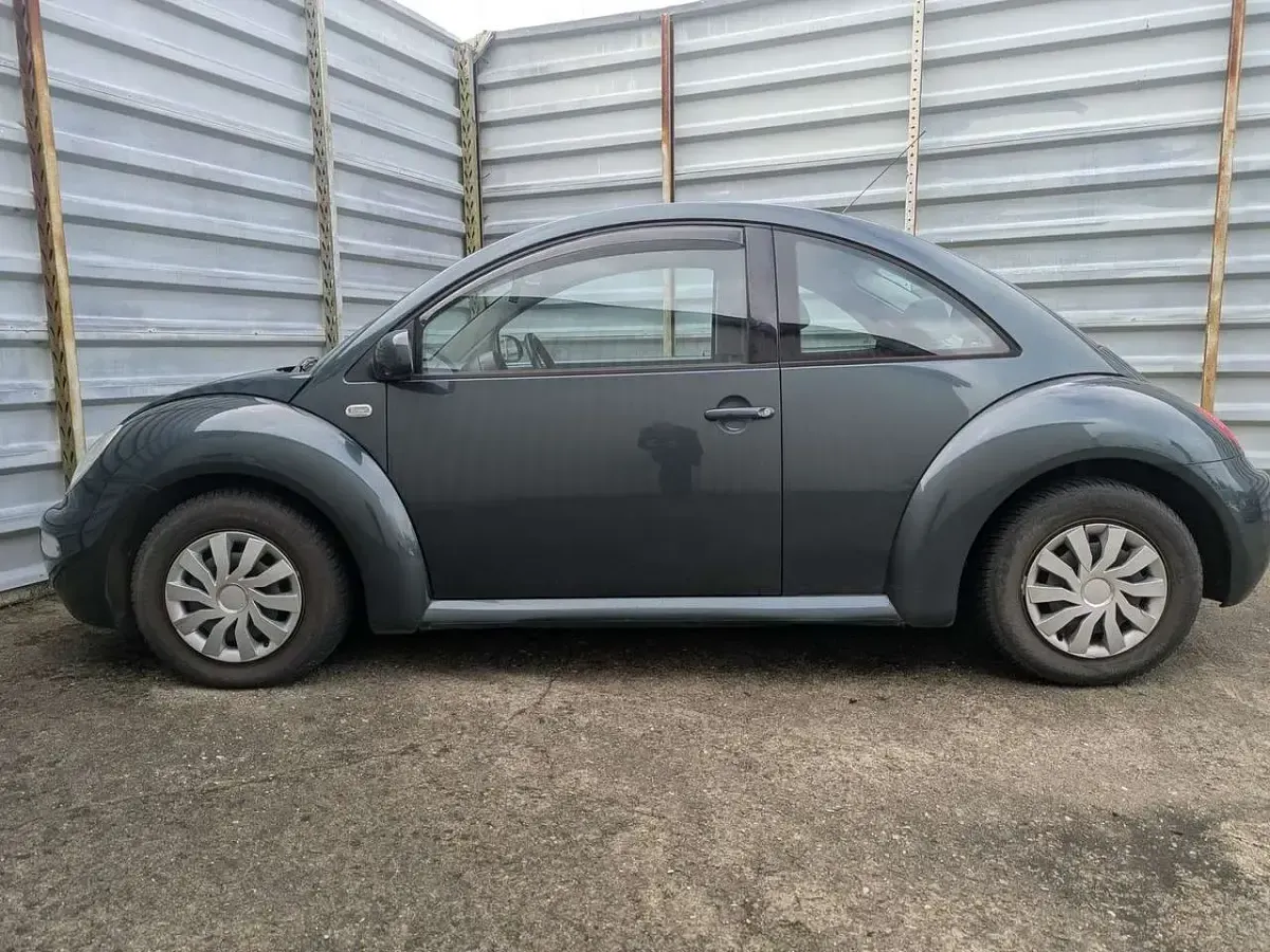 Gebraucht VW New Beetle Style 75 PS (55 kW) 2003 Grün (metallic) Kleinwagen
