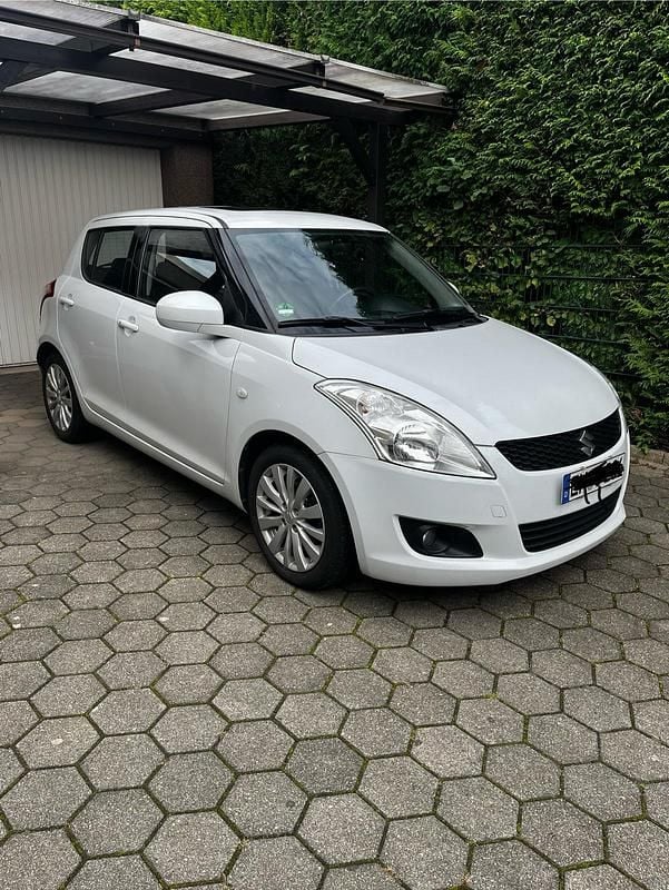 Gebraucht Suzuki Swift 94 PS (69 kW) 2012 Weiß Kleinwagen