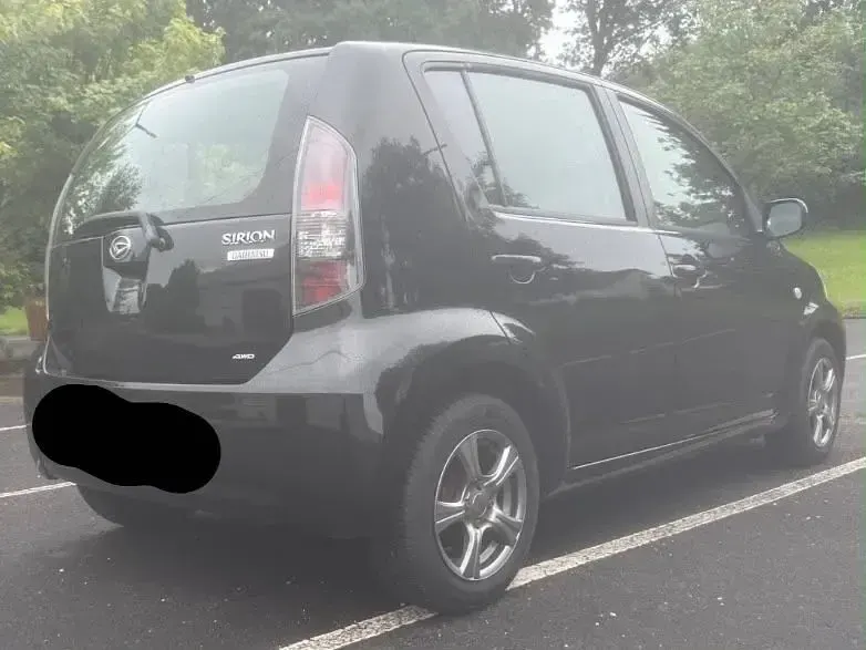 Gebraucht Daihatsu Sirion 91 PS (66 kW) 2010 Schwarz Kleinwagen