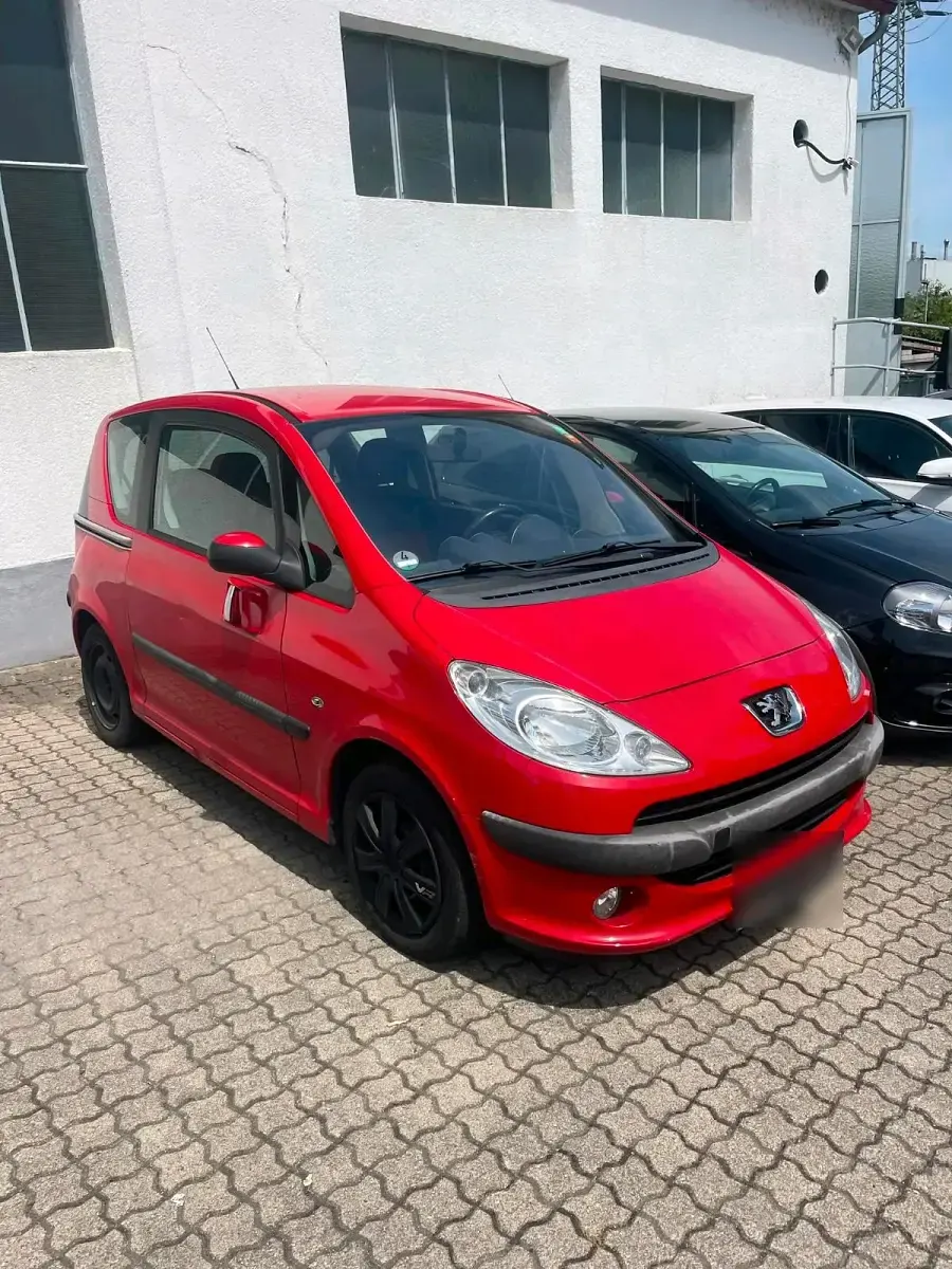 Gebraucht Peugeot 1007 54 PS (39 kW) 2007 Rot Van / Kleinbus