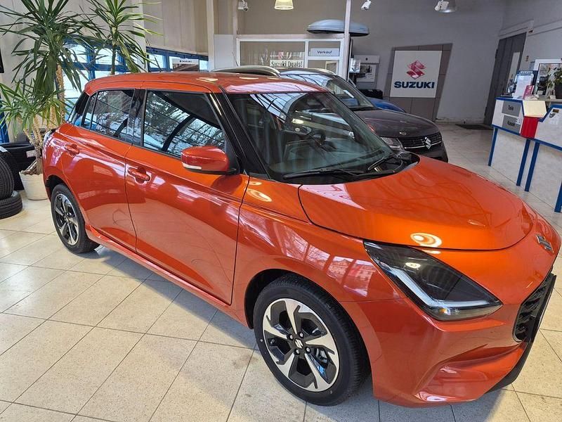 Neu Suzuki Swift Comfort+ 83 PS (61 kW) 2025 Orange Limousine