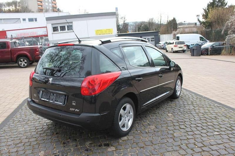 Gebraucht Peugeot 207 Premium 120 PS (88 kW) 2013 Schwarz obsidien/metallic Kombi