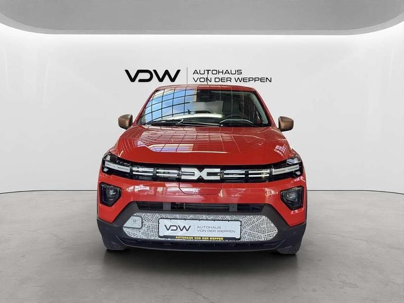 Gebraucht Dacia Spring Extreme 47 kW (65 PS) 2024 Brick red (rot) Kleinwagen