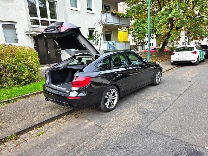 Schwarz Gebraucht 2017 BMW 320 Gran Turismo Sport Line Limousine | 19.500 € (Fairer Preis) - Bild 1/4