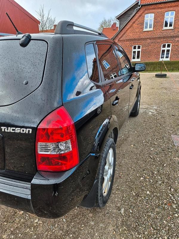 Gebraucht Hyundai Tucson 141 PS (103 kW) 2009 Schwarz SUV