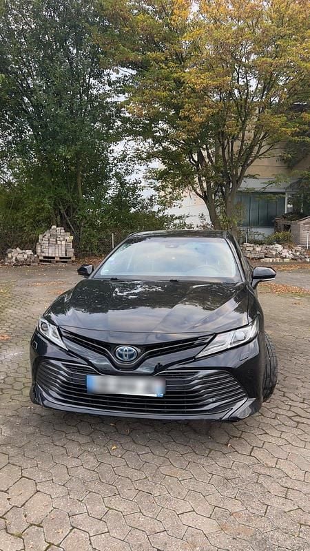Schwarz Gebraucht 2021 Toyota Camry Hybrid Business Edition Limousine | 15.800 € - Bild 1/4