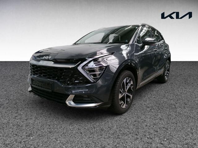 H8g) pentametal met. (grau Gebraucht 2024 Kia Sportage Spirit SUV | 31.940 € (Guter Preis) - Bild 1/4