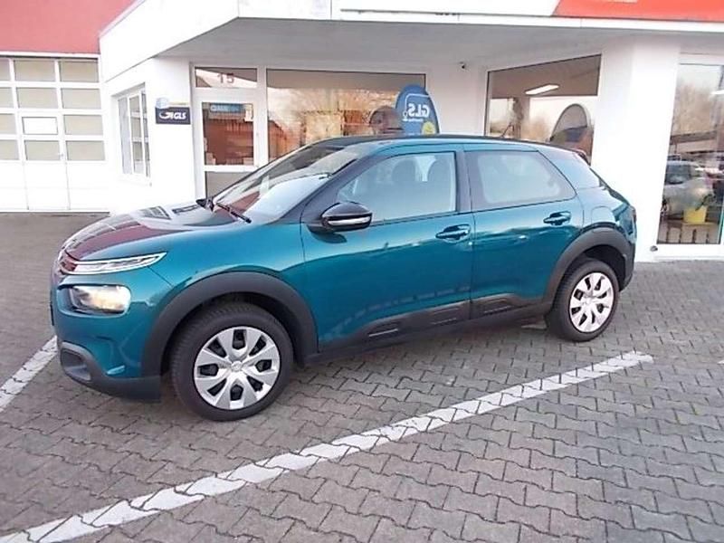 Ultra smaragd perlmutt/met Gebraucht 2018 Citroën C4 Feel SUV | 9.590 € (Fairer Preis) - Bild 1/4