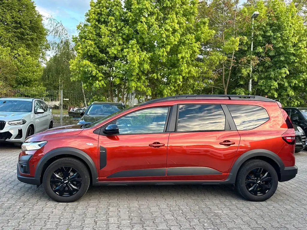 Gebraucht Dacia Jogger Extreme 94 PS (69 kW) 2024 Terracottabraun (metallic) Van / Kleinbus