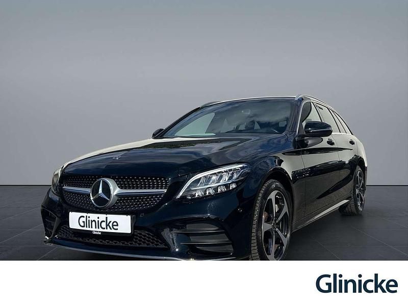 Schwarz unilack Gebraucht 2019 Mercedes C300e AMG line Kombi | 25.390 € (Fairer Preis) - Bild 1/4