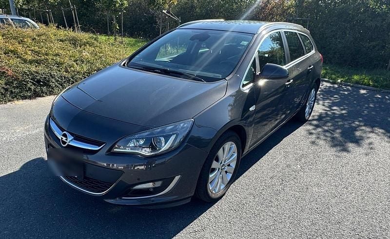 Braun Gebraucht 2015 Opel Astra Kombi | 6.900 € (Fairer Preis) - Bild 1/4