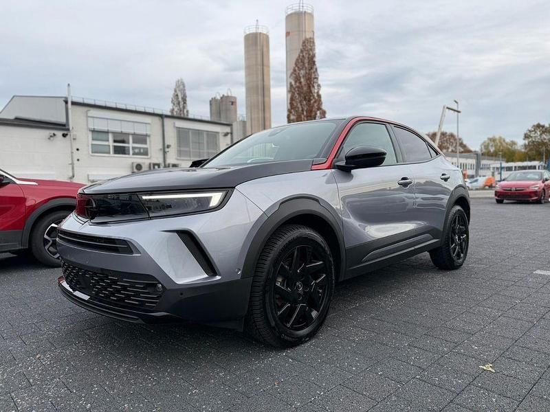 Grau Gebraucht 2023 Opel Mokka-e GS Line SUV | 18.760 € (Guter Preis) - Bild 1/4