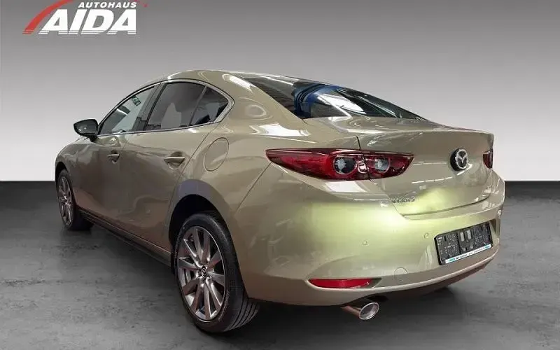 Neu Mazda 3 Exclusive-Line 186 PS (136 kW) 2025 Beige Limousine