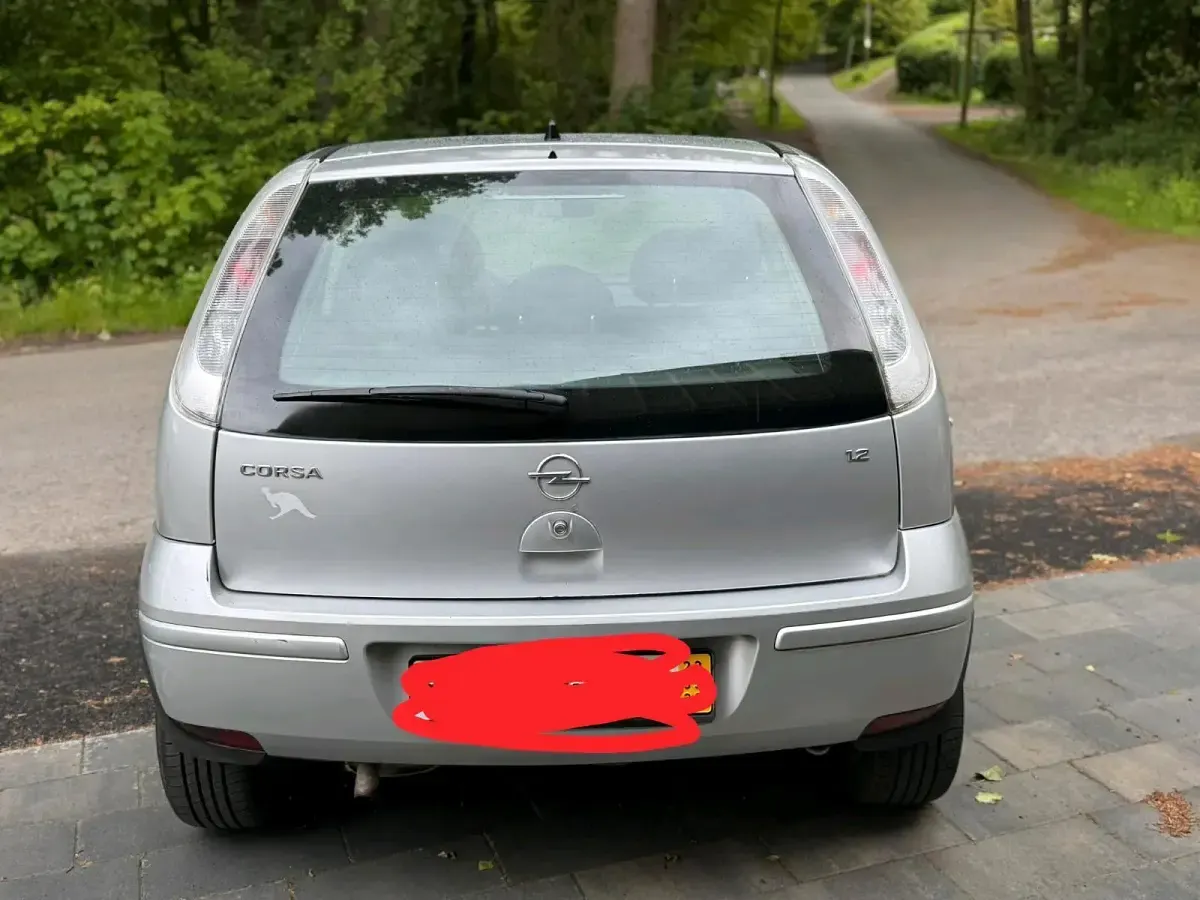 Używany Opel Corsa 75 KM (55 kW) 2006 Szary Hatchback
