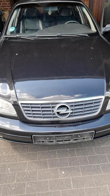 Schwarz Gebraucht 2002 Opel Omega Design Edition Kombi | 1.200 € (Fairer Preis) - Bild 1/4