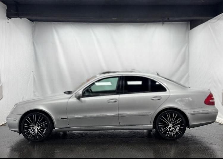 Second-hand Mercedes E200 163 CP (119 kW) 2004 Argintiu Berlinǎ