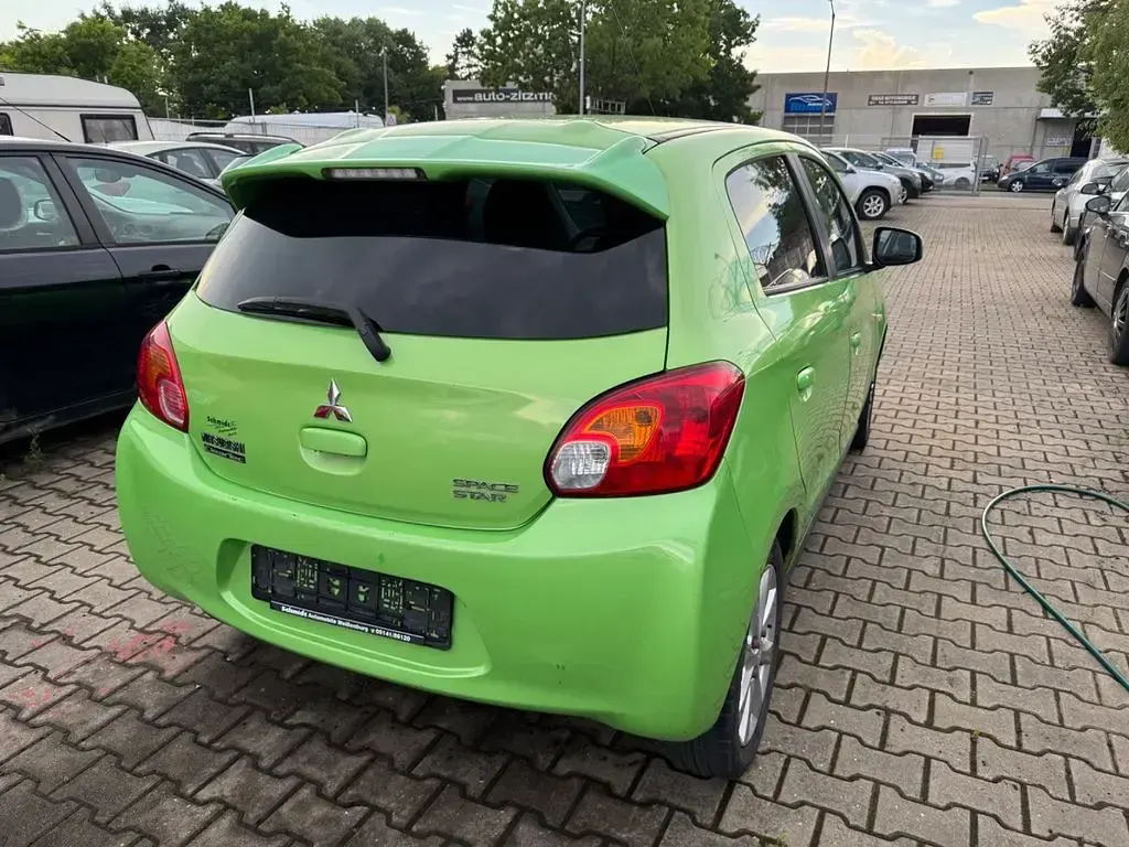 Gebraucht Mitsubishi Space Star 80 PS (58 kW) 2013 Grün Van / Kleinbus