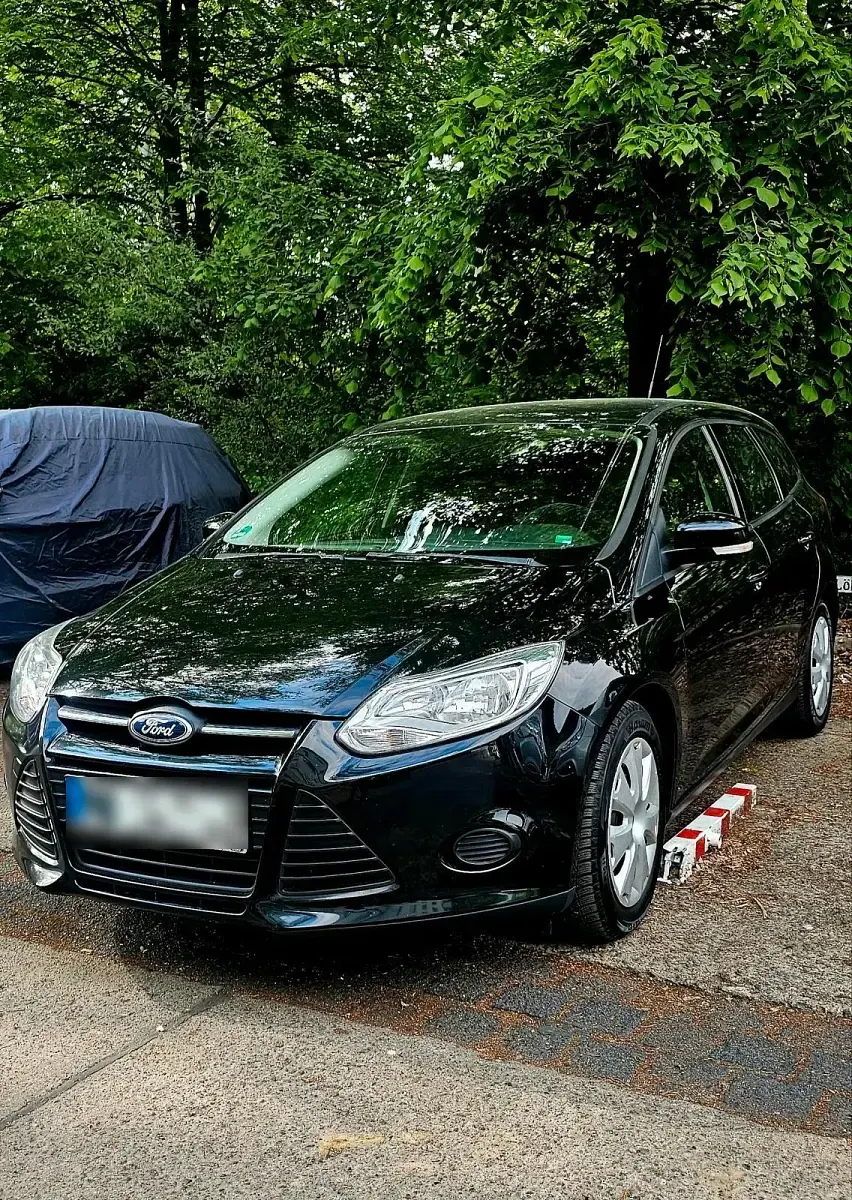 Używany Ford Focus 96 KM (70 kW) 2014 Czarny Kombi