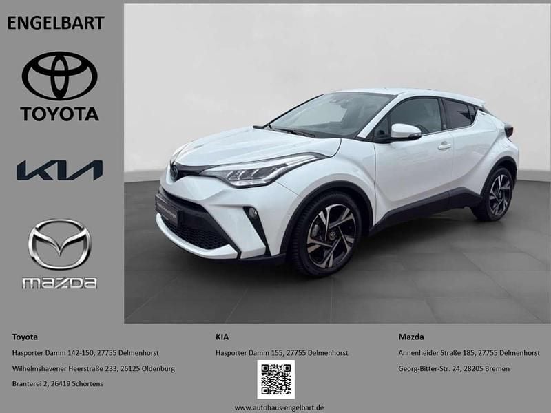 Platinum white pearl mc. Gebraucht 2023 Toyota C-HR+ Team SUV | 24.450 € (Guter Preis) - Bild 1/4
