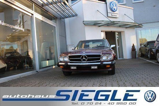 Pajettrot (metallic) Gebraucht 1987 Mercedes 560 Cabrio | 25.940 € - Bild 1/4