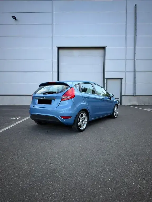 Gebraucht Ford Fiesta Titanium 95 PS (69 kW) 2011 Blau Limousine