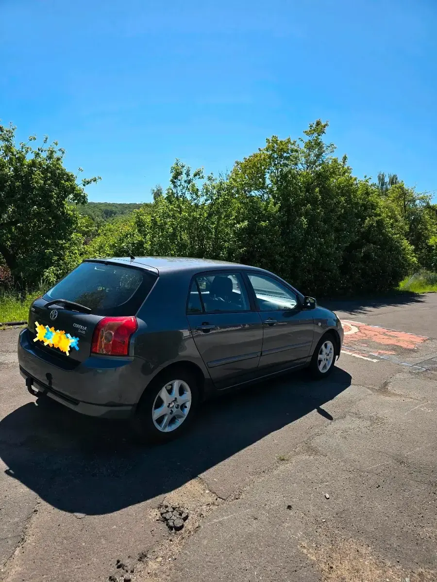 Używany Toyota Corolla 115 KM (84 kW) 2006 Szary Hatchback