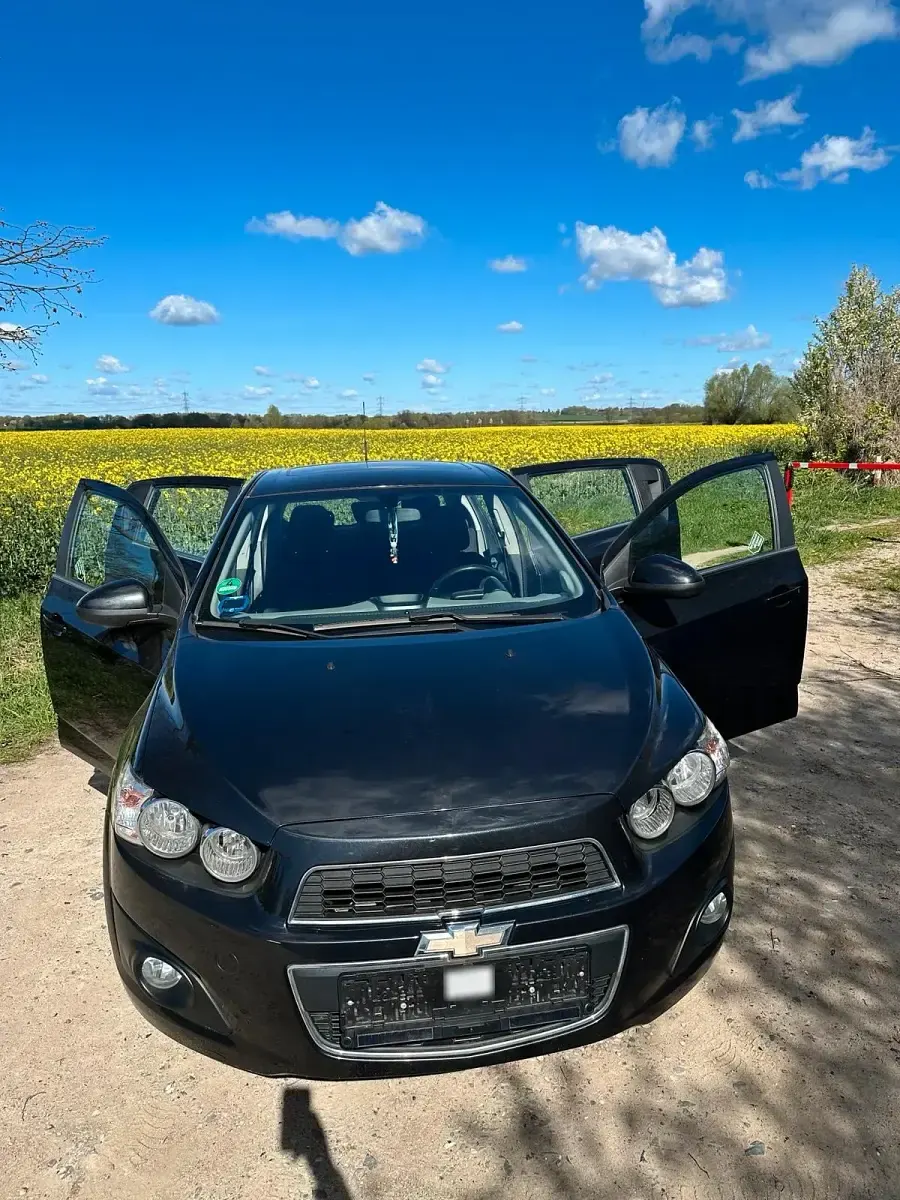 Second-hand Chevrolet Aveo 100 CP (73 kW) 2012 Negru Hatchback