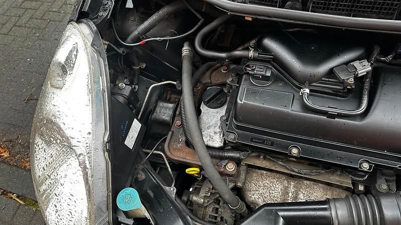 Second-hand Nissan Note 101 CP (74 kW) 2006 Negru Hatchback