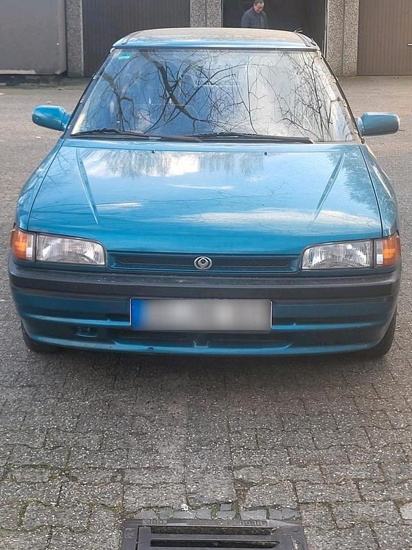 Gebraucht Mazda 323 75 PS (55 kW) 1994 Grün Kleinwagen